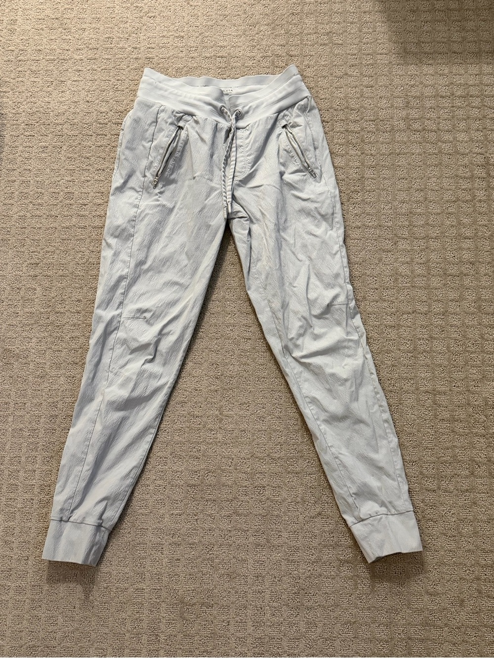 Athleta Light Gray women’s Drawstring Joggers with Zip Pockets